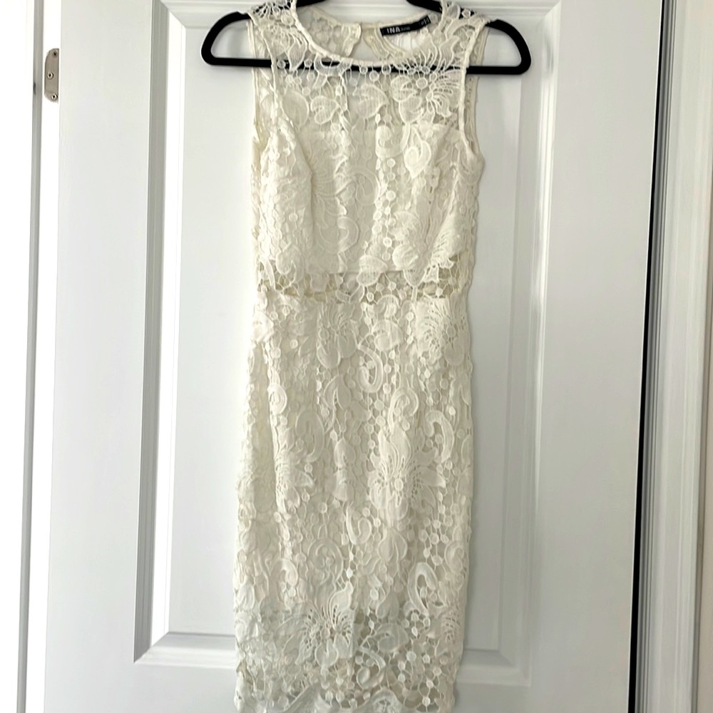 White lace midi dress with sheer and open back details